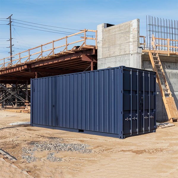 construction site storage containers can be delivered to the site using specialized trucks equipped with cranes for precise placement